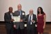 Dr. Russell Jay Hendel receiving the certificate and the medal of his designation as "Inter-Disciplinary Communication" Fellow of the IIIS.